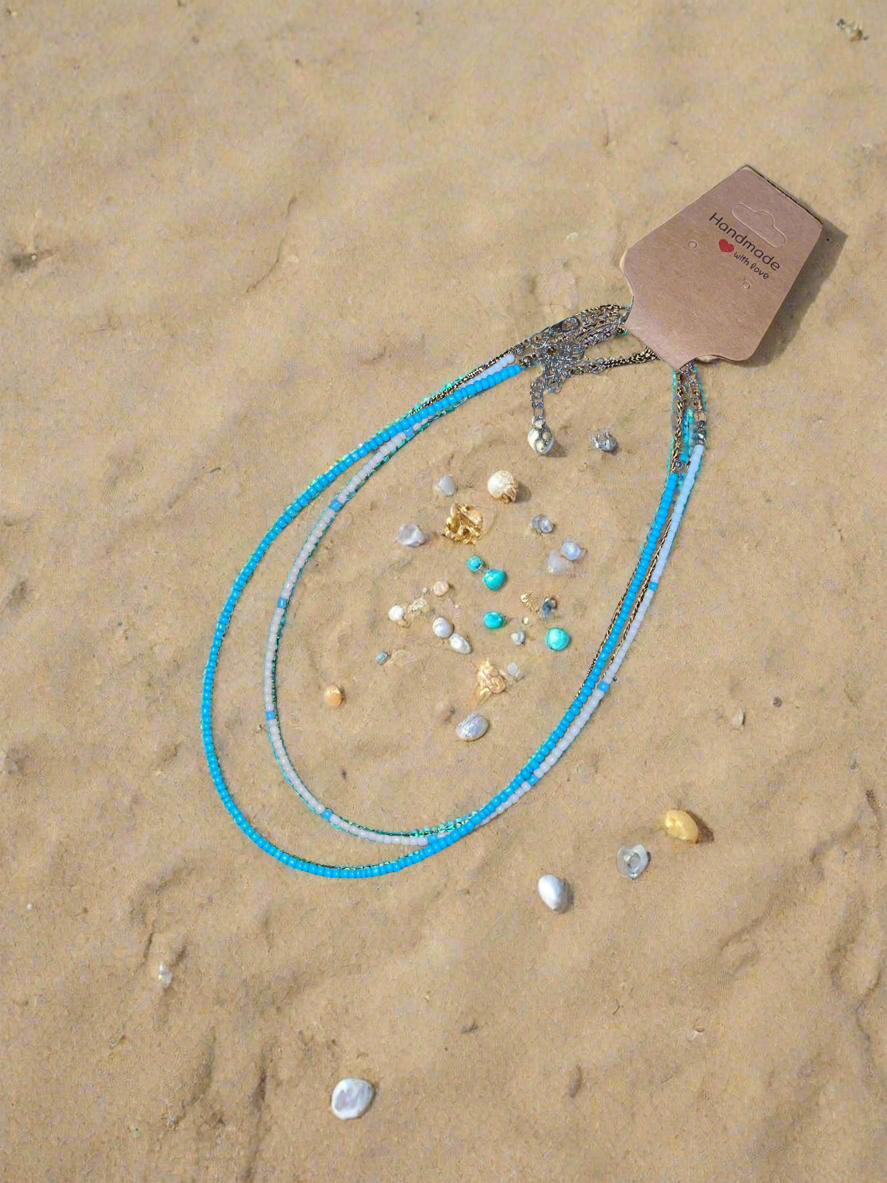 Minimalist blue choker.