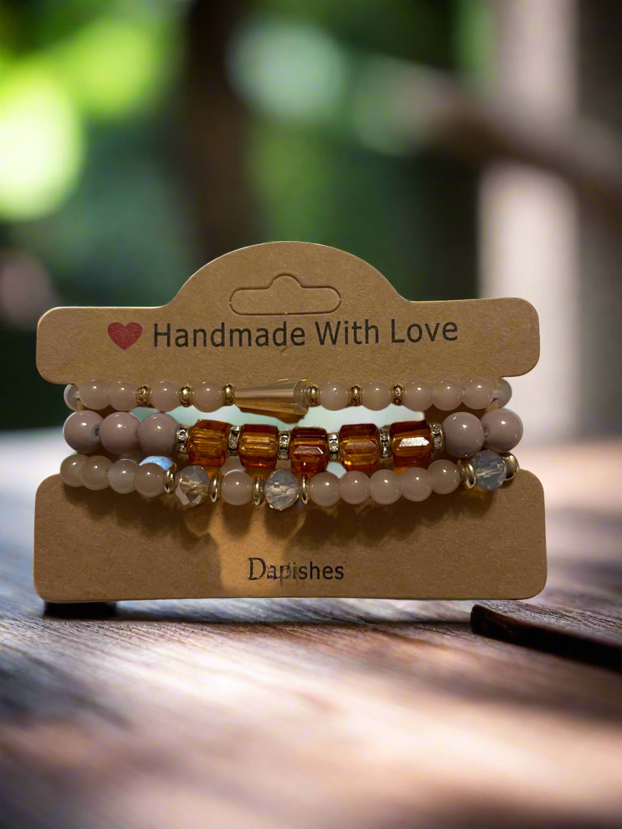 Elegant beige beaded bracelet set.