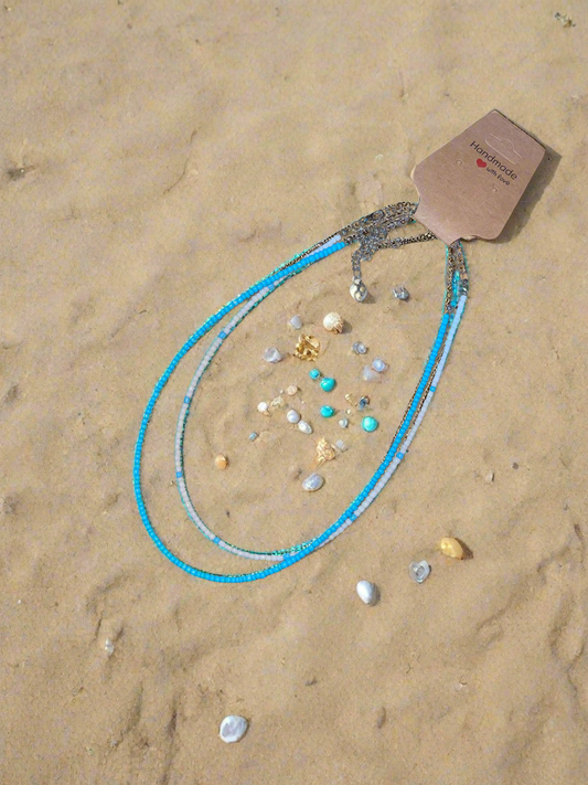 Minimalist blue choker.