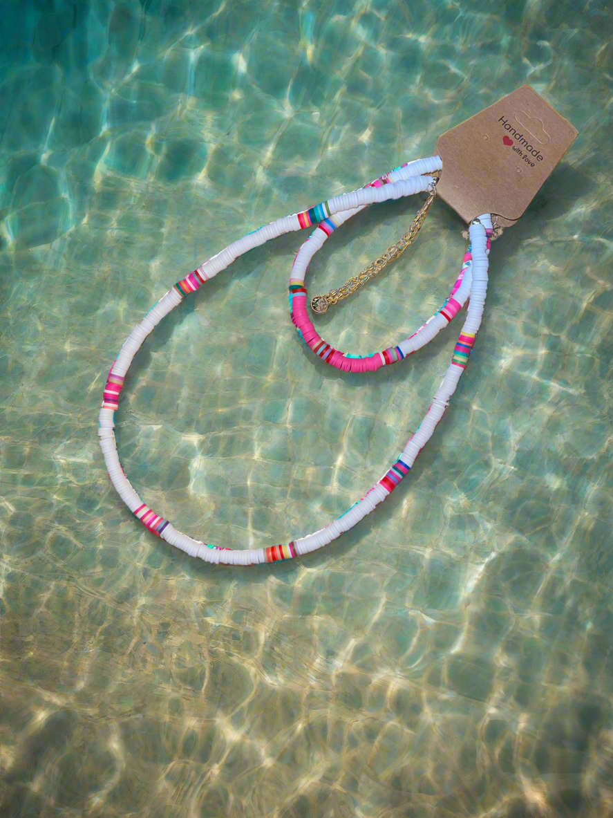 White surfer necklace and ankle bracelet.