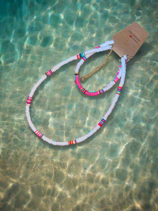 White surfer necklace and ankle bracelet.