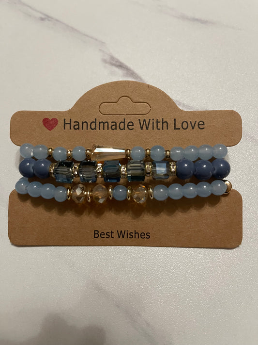 Gorgeous light blue beaded bracelet set.